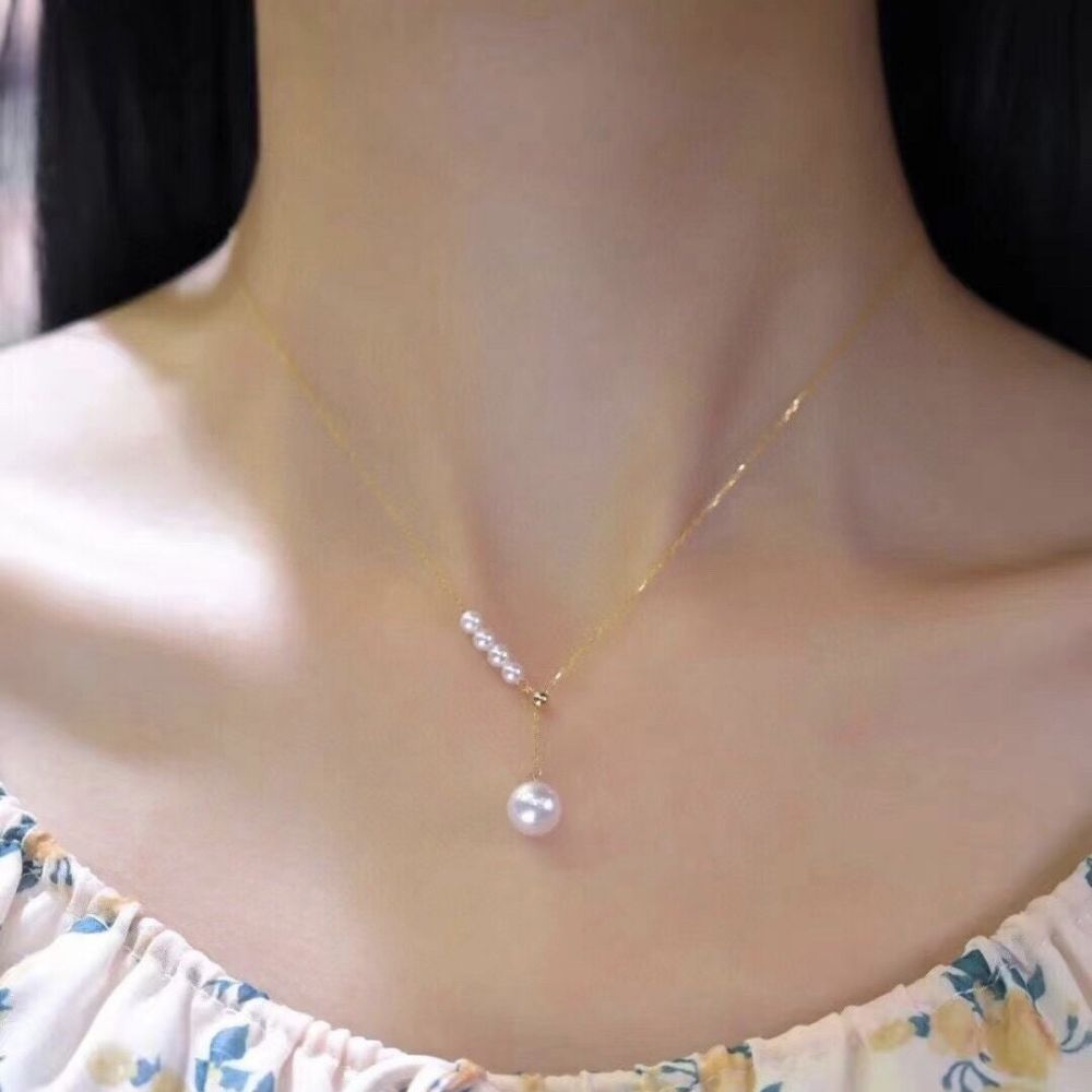 Picture of 18k gold natural pearl necklace