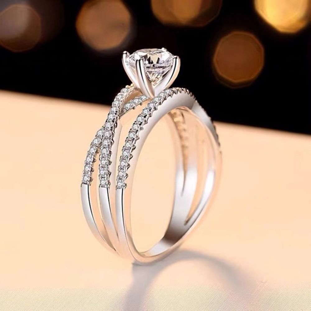Picture of S925 silver crossed hollow-out Moissanite four-claw ring