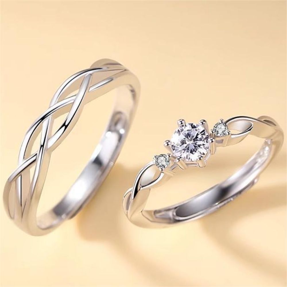 Picture of 925 silver couple rings with green silk entwined