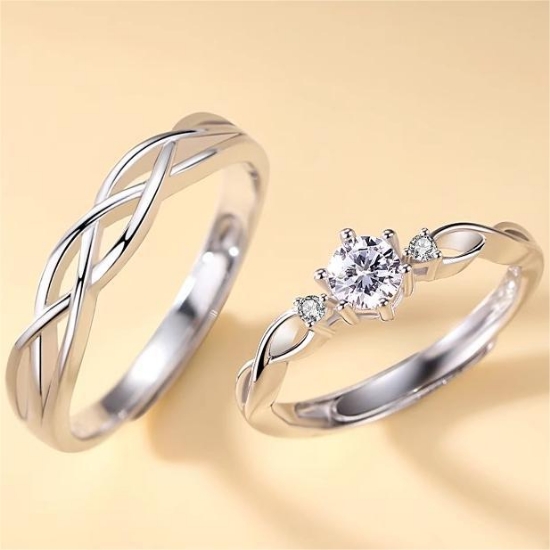 Picture of 925 silver couple rings with green silk entwined