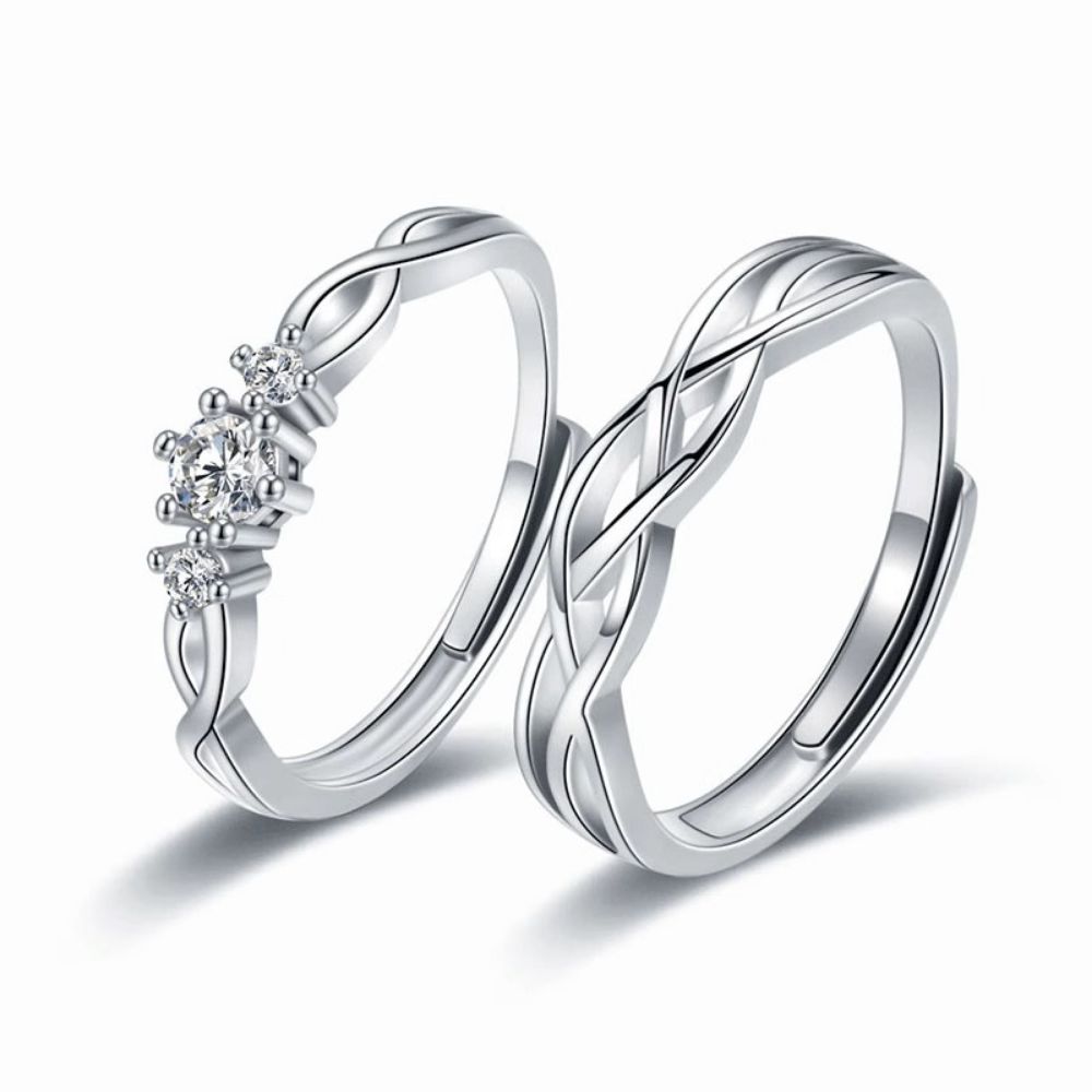Picture of 925 silver couple rings with green silk entwined