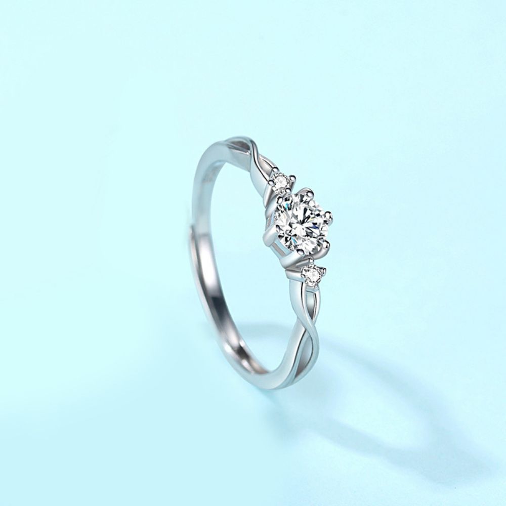 Picture of 925 silver couple rings with green silk entwined